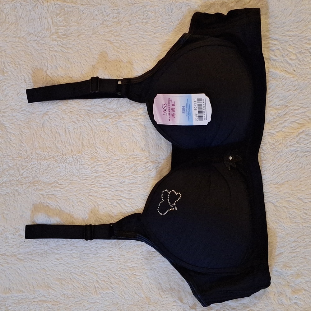 Black bra embleshed with crystals and applique.